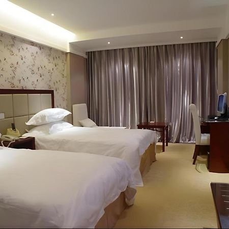New Friendship Hotel Lojang Kültér fotó