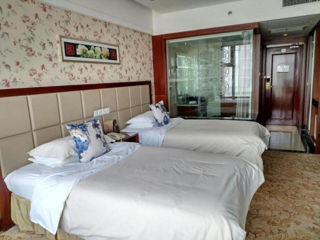 New Friendship Hotel Lojang Kültér fotó